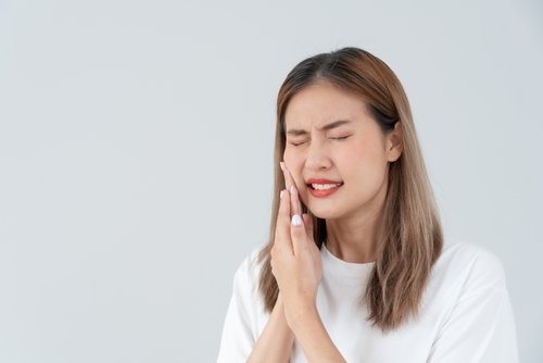 woman with mouth pain