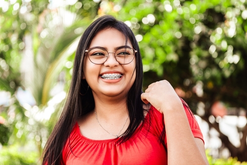 young teen with braces