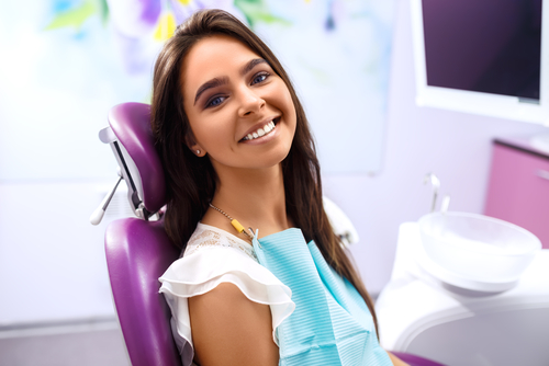 woman smiling at the dentist